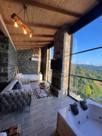 Magnificent Stone House With Jacuzzi, Fireplace in a Facility with Nature View Shared Pool in Rize Ardesen